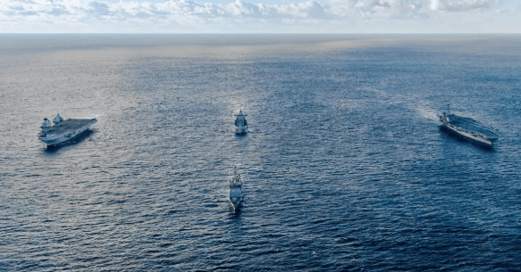 美军急调航母进亚太，日本提前避险，解放军果断出击，反包围开始